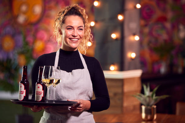 smiling cocktail waiter for house party