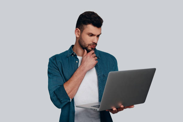 A man considering hiring an event staff A man considering hiring an event staff